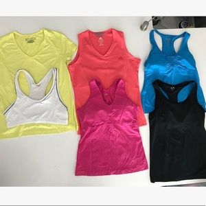 5 workout shirts and a sports bra